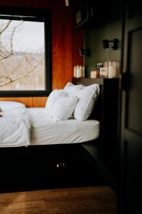 Posteľ alebo postele v izbe v ubytovaní Feelmore Tiny House Eger
