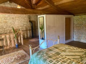 Postel nebo postele na pokoji v ubytování The Cowshed