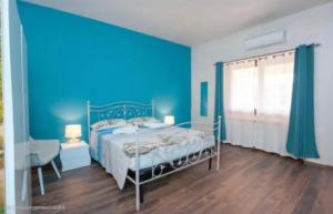 Postel nebo postele na pokoji v ubytování LA SIESTA B&B