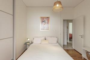 Posteľ alebo postele v izbe v ubytovaní Lovely 1-bedroom apt with balcony