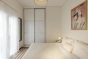 Posteľ alebo postele v izbe v ubytovaní Lovely 1-bedroom apt with balcony