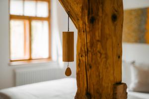 Postel nebo postele na pokoji v ubytování Fajn TAJM Rychleby