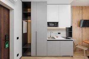 Кухня або міні-кухня у Jam Apartments Shevchenka