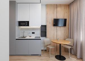 Кухня або міні-кухня у Jam Apartments Shevchenka