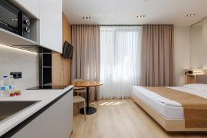 Ліжко або ліжка в номері Jam Apartments Shevchenka