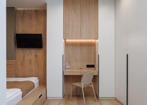 Телевізор і / або розважальний центр в Jam Apartments Shevchenka