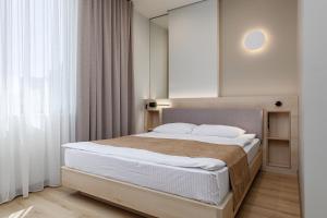 Ліжко або ліжка в номері Jam Apartments Shevchenka