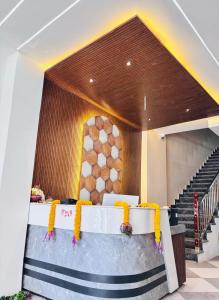 Katil atau katil-katil dalam bilik di Hotel Riddhi Siddhi Ujjain