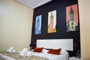 Posteľ alebo postele v izbe v ubytovaní Living-Sevilla Apartments San Lorenzo
