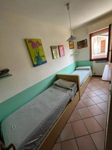 Postel nebo postele na pokoji v ubytování Lampedusa 119 + 22 fotografií