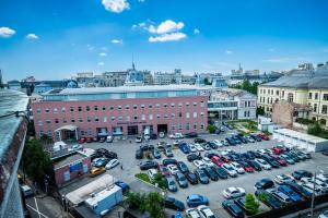 an aerial view of a parking lot in a city at Charming & Cozy 1BR Flat in the Heart of Bucharest in Bucharest