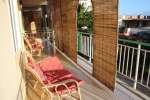 Balcony o terrace sa Bano Tourist Residence - 650 meters from Grand Bay Beach