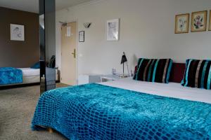 Voodi või voodid majutusasutuse Hotel Prins Boudewijn toas
