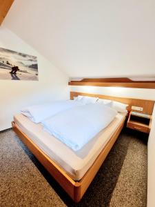 Postel nebo postele na pokoji v ubytování Bergfried