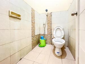 Koupelna v ubytování Pesona Banguntapan Homestay Jogja + 27 fotografií