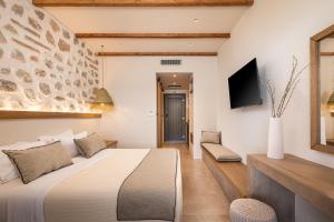 TV a/nebo společenská místnost v ubytování Analeia Luxury Hotel - Adults Only