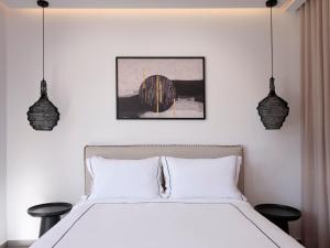 Cama ou camas em um quarto em Kalea Mykonos