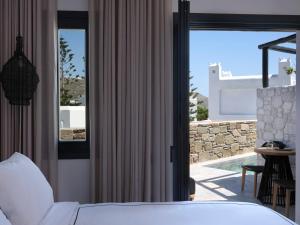 Postel nebo postele na pokoji v ubytování Kalea Mykonos + 37 fotografií