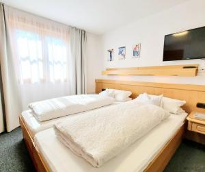 Postel nebo postele na pokoji v ubytování Bergfried