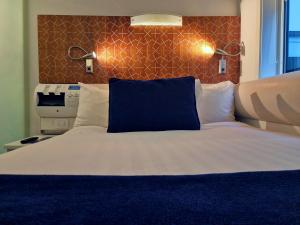 BreakFree on Cashel, an Accor Hotel客房内的一张或多张床位