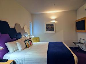 BreakFree on Cashel, an Accor Hotel客房内的一张或多张床位