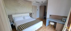 Postel nebo postele na pokoji v ubytování Hotel B&B Fortuna