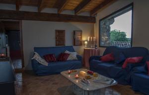 A seating area at Can Fiol Masia