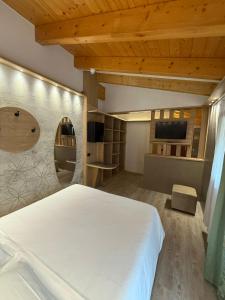 Postel nebo postele na pokoji v ubytování Hotel Villa Fosine