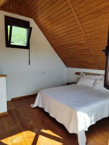 Postel nebo postele na pokoji v ubytování Casas La Pequeña Lulu + 31 fotografií