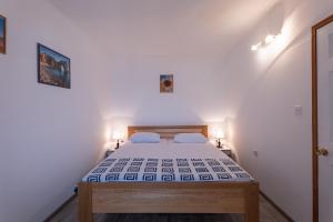 Postel nebo postele na pokoji v ubytování Apartments Kulji