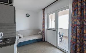 Postel nebo postele na pokoji v ubytování Apartments Kulji