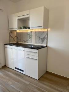 Køkken eller tekøkken på Casa Ginestra