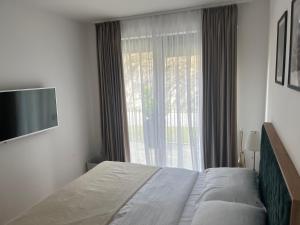 En eller flere senger på et rom på Apartman Little fox Divčibare