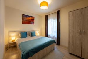 Ένα ή περισσότερα κρεβάτια σε δωμάτιο στο Smart Apartments +18 φωτογραφίες