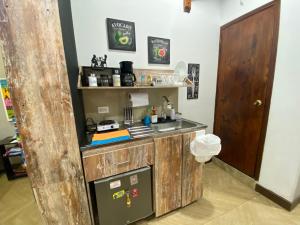 Kuchyň nebo kuchyňský kout v ubytování Apartarstudio muy bien ubicado, cercano a todo!!
