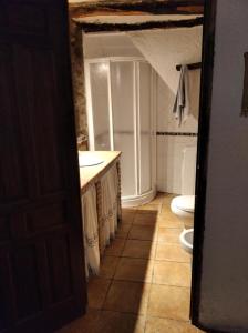 a bathroom with a sink and a toilet at Casa Fuensanta Balcón Al Mar in Granada +20 photos