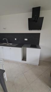 Kuchyň nebo kuchyňský kout v ubytování Maison typique picarde