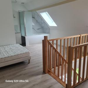 Postel nebo postele na pokoji v ubytování Maison typique picarde