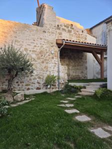 Κήπος έξω από το Le cœur de joli village Français