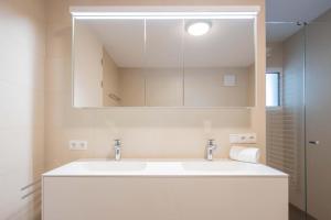 A bathroom at Krone Apartments Schruns, Top 6/7/8 Még 37 kép