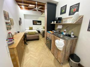Kuchyň nebo kuchyňský kout v ubytování Apartarstudio muy bien ubicado, cercano a todo!!