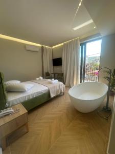 Postel nebo postele na pokoji v ubytování Hotel Parid