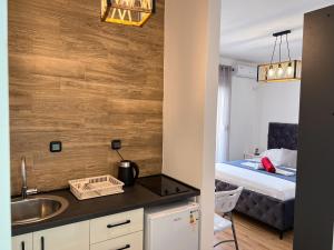 Postel nebo postele na pokoji v ubytování Addy's Apartments + 3 fotografie