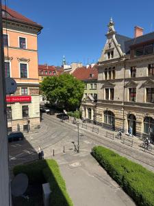 a view of a city street with a building at excellent location in Wrocław