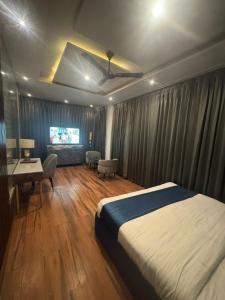 Hotel ML Pride客房内的一张或多张床位