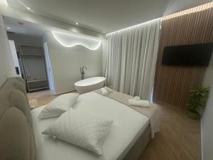 TV a/nebo společenská místnost v ubytování Hotel Parid