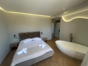 Postel nebo postele na pokoji v ubytování Hotel Parid