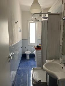 Kúpeľňa v ubytovaní Caio Asinio Apartment