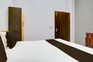 Postel nebo postele na pokoji v ubytování Hotel O HOTEL SHYAM RESIDENCY + 30 fotografií