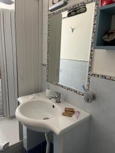 Kúpeľňa v ubytovaní Caio Asinio Apartment